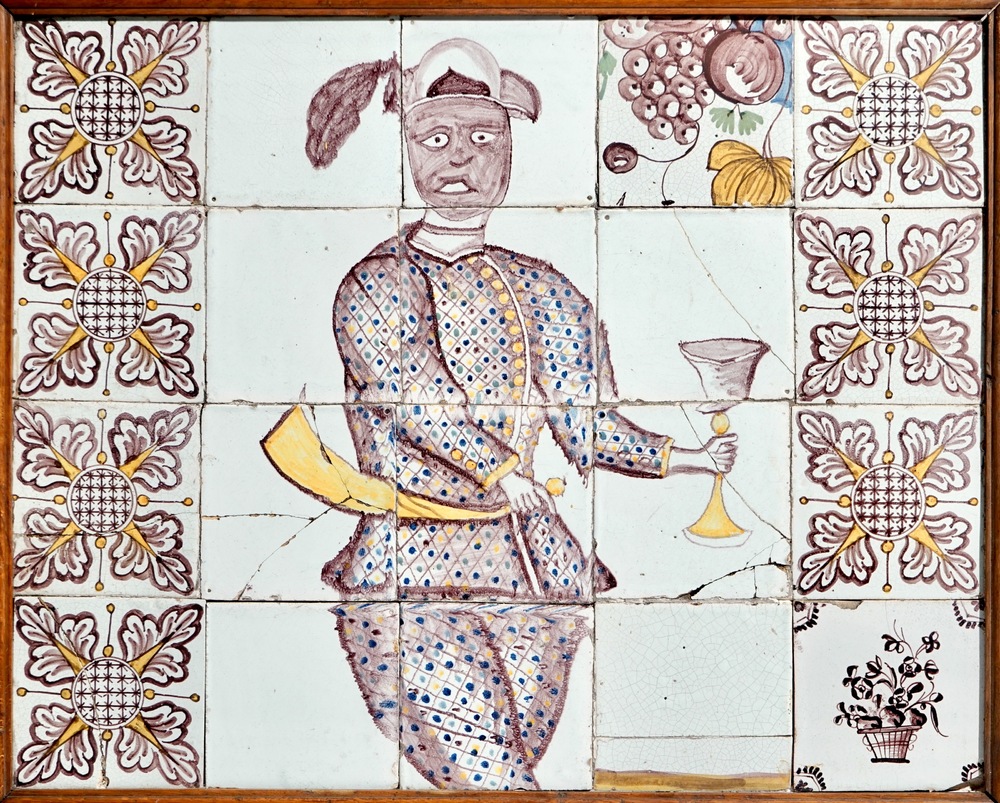 A tile mural with a Moor in manganese and yellow, Lille, France, 18th C.